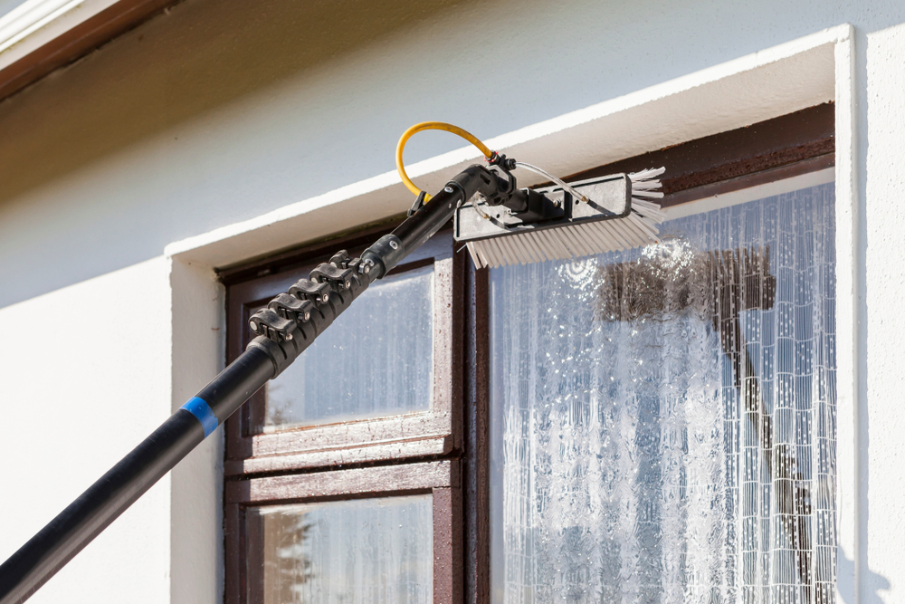 Gutters Cleaning Using Pressure Washer.